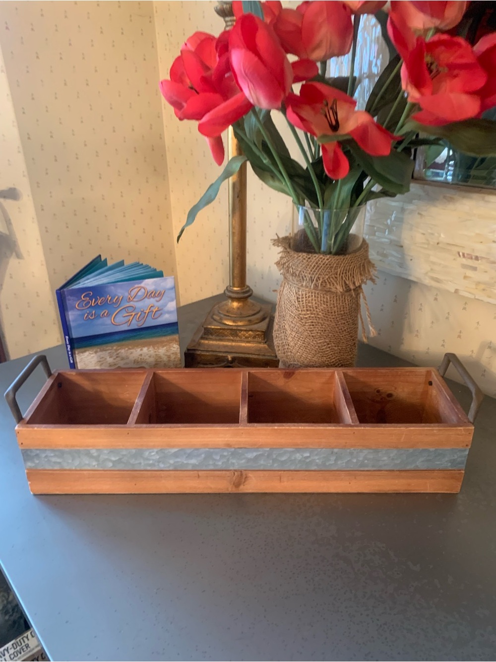 Cheungs, TAN color wooden 4 slot storage crate, has Metal side band and handles.